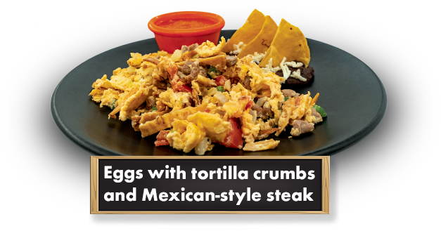 Huevos con migas y filete a la Mexicana